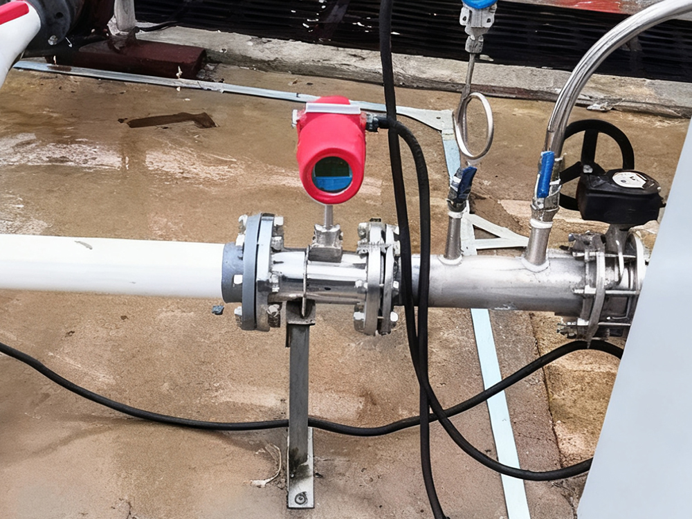 A PokcenserTech thermal mass flow meter mounted on an industrial gas pipeline for accurate, real-time flow monitoring.