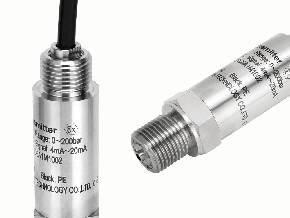 Close-up view of stainless-steel explosion-proof pressure transmitters showing threaded connection, electrical interface, and engraved specifications.
